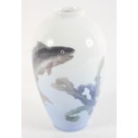 A Royal Copenhagen vase, of slender shouldered form, decorated with a fish and sea weed,