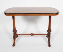 A Victorian walnut and inlaid centre table with amboyna banding on turned supports with scrolling