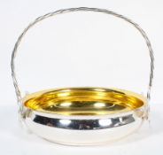 A mid 20th century silver plated basket,