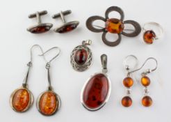 A collection of jewellery to include: Two pairs of earrings; A pair of cufflinks; Two pendants;