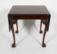 A Chippendale style mahogany drop leaf table,