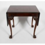 A Chippendale style mahogany drop leaf table,