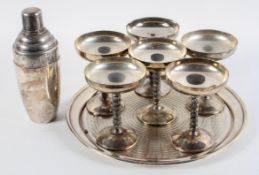 A silver plated cocktail set, to include a cocktail shaker,