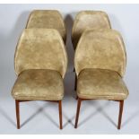 A set of four 1960's Benchairs of Stoe retro vintage faux leather dining chairs having shaped backs