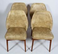 A set of four 1960's Benchairs of Stoe retro vintage faux leather dining chairs having shaped backs