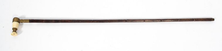 An early Victorian walking cane with monocle handle,