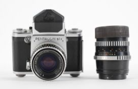 A Pentacon Six medium format camera with two Carl Zeiss lenses