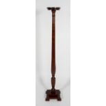 An Edwardian mahogany torchere,