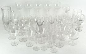 A large collection of wine and other drinking glasses