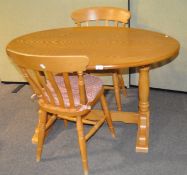 A modern dining table of oval form, 74cm x 115cm x 80cm,