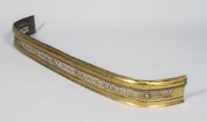 A Victorian brass fire fender, late 19th century,