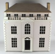 A large vintage two bedroom dolls house,