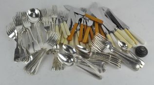 A collection of assorted flatware,
