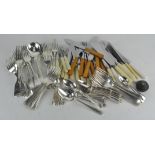 A collection of assorted flatware,