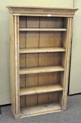 A 5 tier stripped pine bookcase,