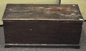 A stained oak blanket box on a plinth base,