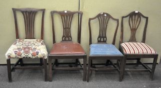 A group of four dining chairs, 2 being mahogany, the others oak, all with upholstered seats,
