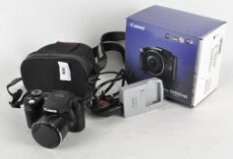 A Canon Powershot 5X510 HS digital camera,