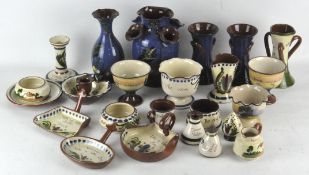 An assorted collection of Torquay ware, to include vases, candlesticks,