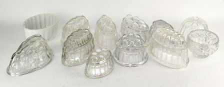 A collection of glass jelly moulds, to include 'London promenade',