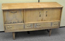 A 1960's retro sideboard on tapering legs,