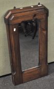 A bespoke made pine Church pew end, converted into a mirror,