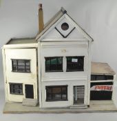 A vintage two storey dolls house,