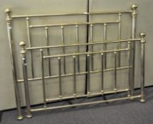 A king size brass bed headboard and footboard,