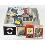 A collection of various playing cards, most being traditional,