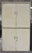 A large two tier metal storage cabinet, each tier with two opening doors,