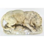 A plaster figure of a lion,