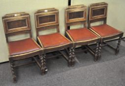 A set of four Art Deco oak dining chairs with drop in seats,