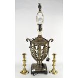 A modern metal table lamp, of stylised urn form,