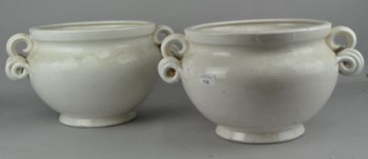 A pair of two handled Jardiniere planters, both being crazed throughout,