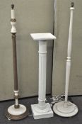 Two painted standard lamps and a painted columned plant stand,
