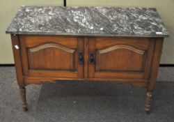 A 20th century walnut and marble topped washstand,