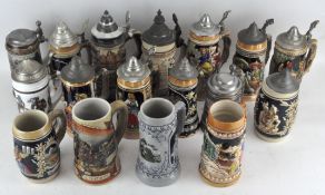 A collection of German ceramic Steins, of various shapes and sizes,