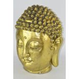 A large gilt painted Buddha head,