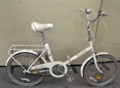 A vintage Raleigh 'Compact Plush' folding bicycle,