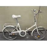 A vintage Raleigh 'Compact Plush' folding bicycle,