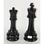 Two Andrew Martin chess pieces, a King and Queen,