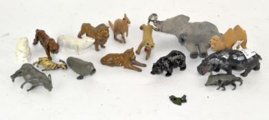 A collection of Britains lead animals, including a lion, hippo,