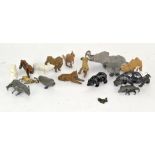 A collection of Britains lead animals, including a lion, hippo,