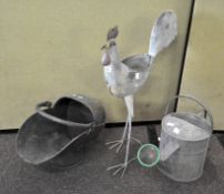 A copper coal scuttle, tin watering can and a cockerel garden ornament,