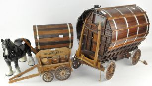 A large model wooden gypsy carriage/cart with filled interior, 50cm long, together with similar,