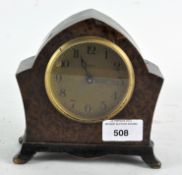 A mid-century Kiensle mantel clock, the dial with Arabic numerals denoting hours,