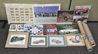 A collection of vintage automobilia, including Mercedes Benz car badge, a metal jaguar sign,