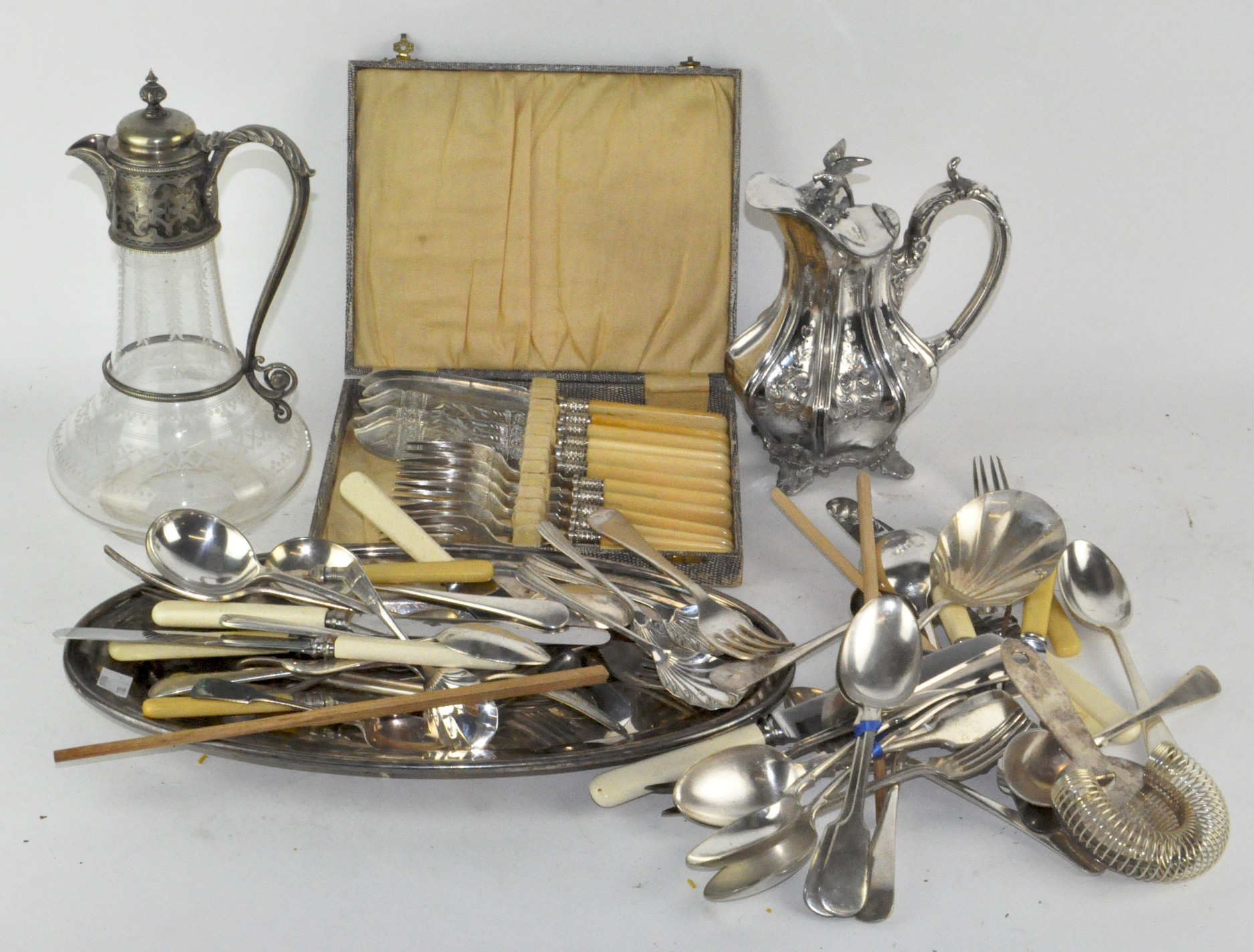 A collection of silver plated items,