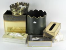 A collection of tissue tins and paper bins
