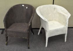 Two Lloyd Loom dark brown and white chairs.